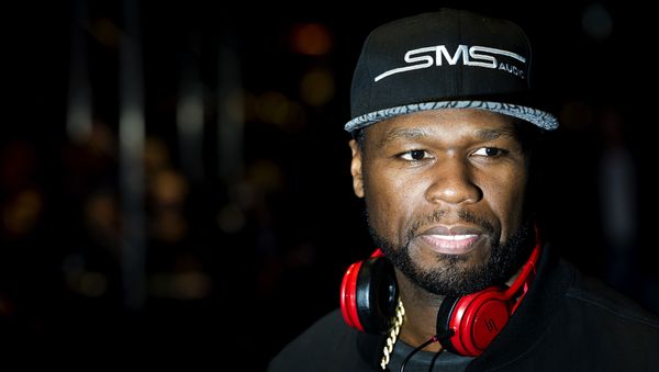US rapper 50 Cent smiles during the release party of his new SMS Audio headphones in the Heineken Music Hall, in Amsterdam, the Netherlands, on October 31, 2014 - Sputnik International
