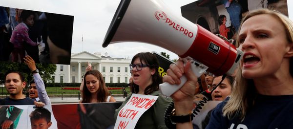 (File) Maggie Thompson from Generation Progress, right, leads protest chants against the Trump administration's immigration policy that results in the separation of children from their parents at the southern border of the U.S. outside of the White House in Washington, U.S., June 21, 2018 (File) Maggie Thompson from Generation Progress, right, leads protest chants against the Trump administration's immigration policy that results in the separation of children from their parents at the southern border of the U.S. outside of the White House in Washington, U.S., June 21, 2018 - Sputnik International