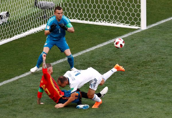 Soccer Football - World Cup - Round of 16 - Spain vs Russia - Luzhniki Stadium, Moscow, Russia - July 1, 2018 Spain's Sergio Ramos scores their first goal Soccer Football - World Cup - Round of 16 - Spain vs Russia - Luzhniki Stadium, Moscow, Russia - July 1, 2018 Spain's Sergio Ramos scores their first goal - Sputnik International
