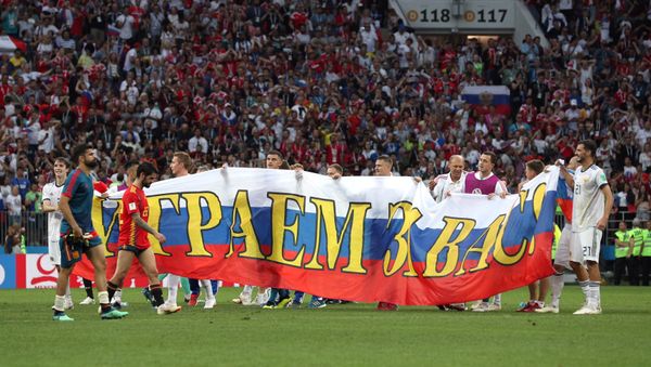 Soccer Football - World Cup - Round of 16 - Spain vs Russia - Luzhniki Stadium, Moscow, Russia - July 1, 2018 Russia players celebrate winning the penalty shootout - Sputnik International