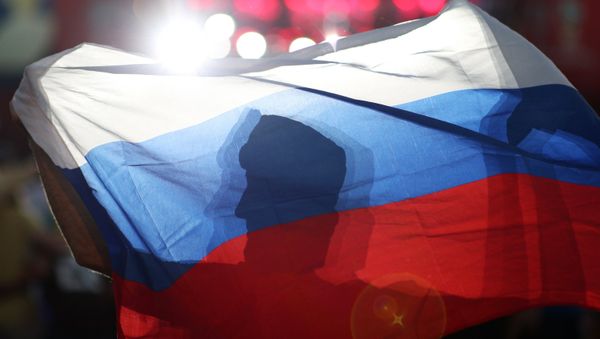 Fans celebrate the victory of the Russian team at the round of 16 match against Spain during the 2018 World Cup. - Sputnik International