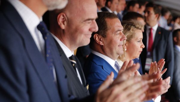 Russian Prime Minister Dmitry Medvedev and his wife Svetlana during the match of the World Cup 1/8 finals between Spain and Russia. - Sputnik International