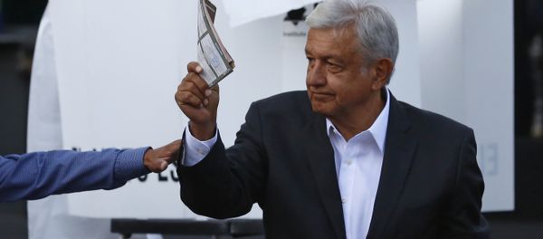 Presidential candidate Andres Manuel Lopez Obrador, of the MORENA party, shows his ballot to the press before casting it during general elections in Mexico City, Sunday, July 1, 2018. Sunday’s elections for posts at every level of government are Mexico’s largest ever and have become a referendum on corruption, graft and other tricks used to divert taxpayer money to officials’ pockets and empty those of the country’s poor - Sputnik International