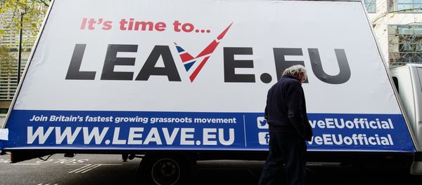 A man walks past a campaign poster ahead of a press briefing by the Leave.EU campaign group in central London on November 18, 2015 A man walks past a campaign poster ahead of a press briefing by the Leave.EU campaign group in central London on November 18, 2015 - Sputnik International