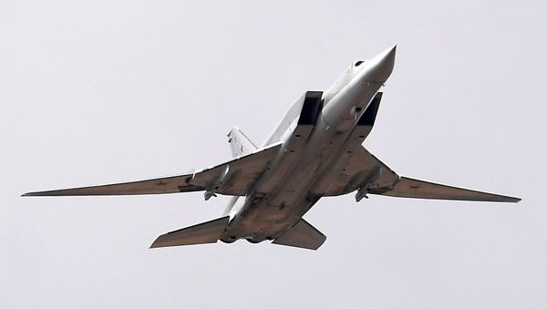 A Tupolev Tu-22M3 Backfire strategic bomber during a Victory Parade rehearsal at the Alabino training ground in the Moscow Region - Sputnik International