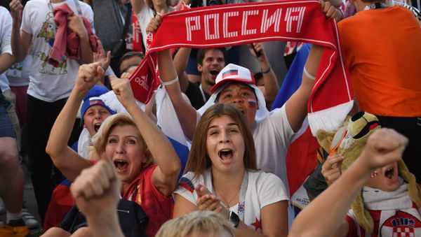 Russia's fans celebrate team's victory watching the World Cup Round of 16 soccer match between Spain - Russia outside the Nizhny Novgorod stadium, in Nizhny Novgorod, Russia, July 1, 2018 Russia's fans celebrate team's victory watching the World Cup Round of 16 soccer match between Spain - Russia outside the Nizhny Novgorod stadium, in Nizhny Novgorod, Russia, July 1, 2018 - Sputnik International