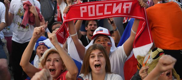 Russia's fans celebrate team's victory watching the World Cup Round of 16 soccer match between Spain - Russia outside the Nizhny Novgorod stadium, in Nizhny Novgorod, Russia, July 1, 2018 Russia's fans celebrate team's victory watching the World Cup Round of 16 soccer match between Spain - Russia outside the Nizhny Novgorod stadium, in Nizhny Novgorod, Russia, July 1, 2018 - Sputnik International