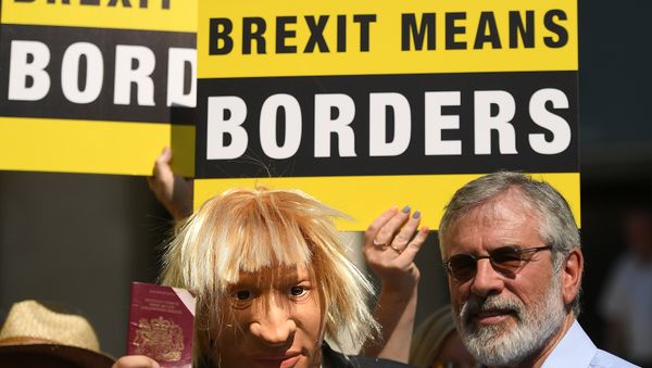 An actor wearing a Boris Johnson mask is joined by Sinn Fein's Gerry Adams during a 'Borders Against Brexit' protest in the border town of Dundalk, Ireland, June 28, 2018 An actor wearing a Boris Johnson mask is joined by Sinn Fein's Gerry Adams during a 'Borders Against Brexit' protest in the border town of Dundalk, Ireland, June 28, 2018 - Sputnik International
