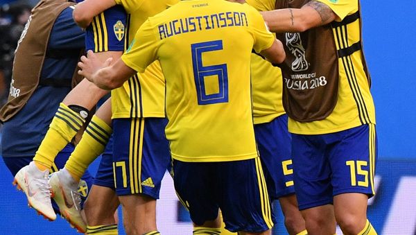 Soccer Football - World Cup - Round of 16 - Sweden vs Switzerland - Saint Petersburg Stadium, Saint Petersburg, Russia - July 3, 2018 Sweden's Oscar Hiljemark and team mates celebrate after the match - Sputnik International