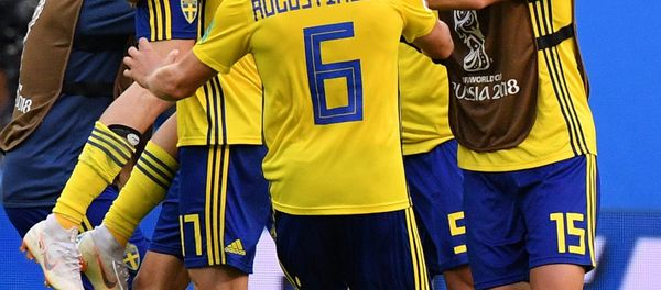 Soccer Football - World Cup - Round of 16 - Sweden vs Switzerland - Saint Petersburg Stadium, Saint Petersburg, Russia - July 3, 2018 Sweden's Oscar Hiljemark and team mates celebrate after the match - Sputnik International