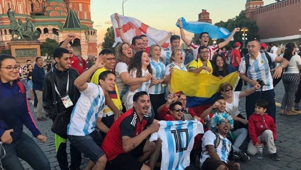 Football fans near the Saint Basil's Cathedral in the Red Square in Moscow Football fans near the Saint Basil's Cathedral in the Red Square in Moscow - Sputnik International