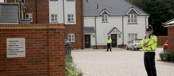 British police officers stand outside a residential property in Amesbury, England, Wednesday, July 4, 2018 - Sputnik International