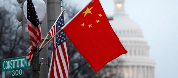 FILE PHOTO: The People's Republic of China flag and the U.S. Stars and Stripes fly on a lamp post along Pennsylvania Avenue near the U.S. Capitol FILE PHOTO: The People's Republic of China flag and the U.S. Stars and Stripes fly on a lamp post along Pennsylvania Avenue near the U.S. Capitol - Sputnik International