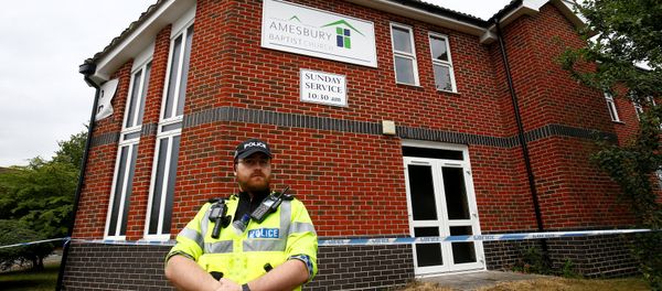 A police officer stands in front of Amesbury Baptist Church, which has been cordoned off after two people were hospitalised and police declared a 'major incident', in Amesbury, Wiltshire, Britain, July 4, 2018 A police officer stands in front of Amesbury Baptist Church, which has been cordoned off after two people were hospitalised and police declared a 'major incident', in Amesbury, Wiltshire, Britain, July 4, 2018 - Sputnik International