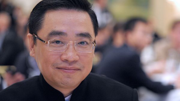 Wang Jian (pictured), who reportedly fell to his death in France while taking a photograph - Sputnik International