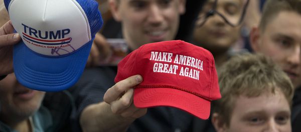 Supporters hold out their hats to get them autographed by Republican presidential candidate Donald Trump at a rally Sunday, Jan. 31, 2016, in Council Bluffs, Iowa Supporters hold out their hats to get them autographed by Republican presidential candidate Donald Trump at a rally Sunday, Jan. 31, 2016, in Council Bluffs, Iowa - Sputnik International