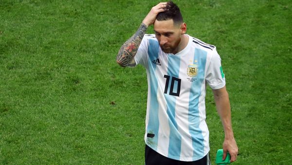 Soccer Football - World Cup - Round of 16 - France vs Argentina - Kazan Arena, Kazan, Russia - June 30, 2018 Argentina's Lionel Messi looks dejected at the end of the match - Sputnik International