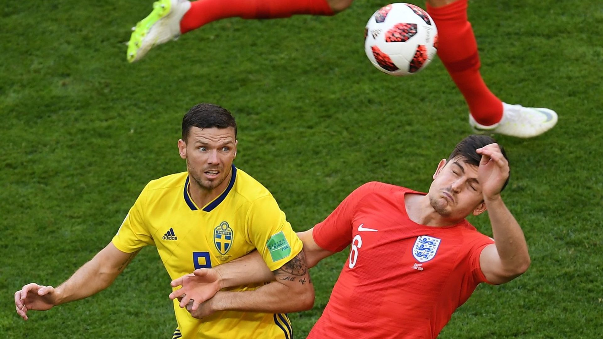 Sweden's Marcus Berg, left, and England's Harry Maguire struggle for a ball during the World Cup quarterfinal soccer match between Sweden and England, at the Samara Arena, in Samara, Russia, July 7, 2018 Sweden's Marcus Berg, left, and England's Harry Maguire struggle for a ball during the World Cup quarterfinal soccer match between Sweden and England, at the Samara Arena, in Samara, Russia, July 7, 2018 - Sputnik International, 1920, 27.06.2022