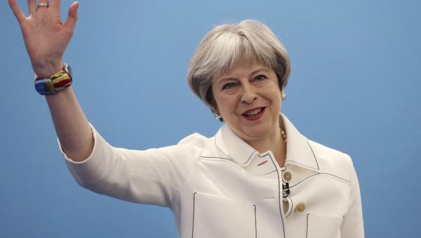 Britain's Prime Minister Theresa May, gestures during the Conservative Party's Spring Forum in central London, Saturday, March 17, 2018. Britain's Prime Minister Theresa May, gestures during the Conservative Party's Spring Forum in central London, Saturday, March 17, 2018. - Sputnik International