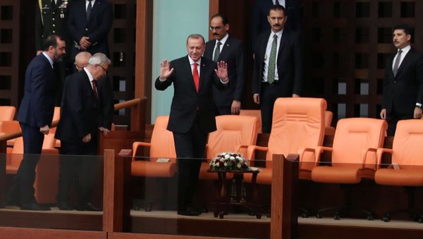 Turkish President Tayyip Erdogan greets deputies at the beginning of an oath-taking ceremony at the Turkish parliament in Ankara. - Sputnik International