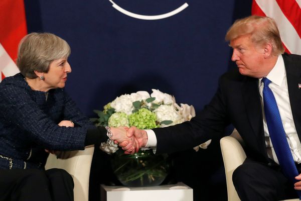 U.S. President Donald Trump shake hands with Britain's Prime Minister Theresa May during the World Economic Forum (WEF) annual meeting in Davos, Switzerland January 25, 2018 U.S. President Donald Trump shake hands with Britain's Prime Minister Theresa May during the World Economic Forum (WEF) annual meeting in Davos, Switzerland January 25, 2018 - Sputnik International