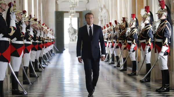 French President Emmanuel Macron walks through the Galerie des Bustes (Busts Gallery) to access Versailles' hemicycle to address both the upper and lower houses of the French parliament at a special session in Versailles, near Paris, 9 July 2018. French President Emmanuel Macron walks through the Galerie des Bustes (Busts Gallery) to access Versailles' hemicycle to address both the upper and lower houses of the French parliament at a special session in Versailles, near Paris, 9 July 2018. - Sputnik International