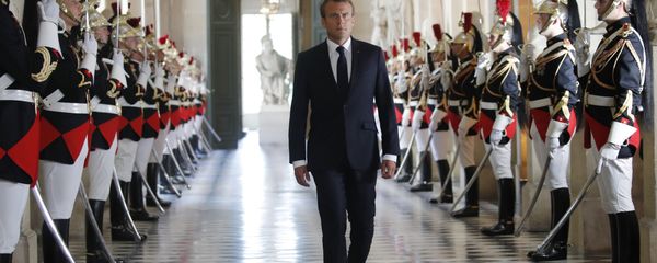 French President Emmanuel Macron walks through the Galerie des Bustes (Busts Gallery) to access Versailles' hemicycle to address both the upper and lower houses of the French parliament at a special session in Versailles, near Paris, 9 July 2018. French President Emmanuel Macron walks through the Galerie des Bustes (Busts Gallery) to access Versailles' hemicycle to address both the upper and lower houses of the French parliament at a special session in Versailles, near Paris, 9 July 2018. - Sputnik International
