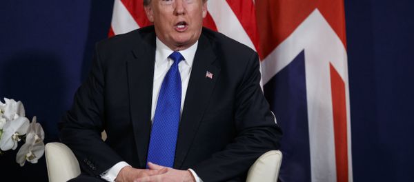 President Donald Trump listens during a meeting with British Prime Minister Theresa May at the World Economic Forum, Thursday, Jan. 25, 2018, in Davos. President Donald Trump listens during a meeting with British Prime Minister Theresa May at the World Economic Forum, Thursday, Jan. 25, 2018, in Davos. - Sputnik International