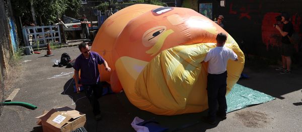 People inflate a helium filled Donald Trump blimp which they hope to deploy during The President of the United States' upcoming visit, in London, Britain, June 26, 2018 People inflate a helium filled Donald Trump blimp which they hope to deploy during The President of the United States' upcoming visit, in London, Britain, June 26, 2018 - Sputnik International
