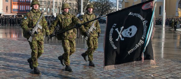 Military officers march during a military parade to celebrate 100 years since Estonia declared independence for the first time in 1918, in Tallinn on February 24, 2018 Military officers march during a military parade to celebrate 100 years since Estonia declared independence for the first time in 1918, in Tallinn on February 24, 2018 - Sputnik International