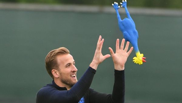 England's Harry Kane plays with a toy rooster during the national soccer team's training session in St. Petersburg, Russia, July 10, 2018. England's Harry Kane plays with a toy rooster during the national soccer team's training session in St. Petersburg, Russia, July 10, 2018. - Sputnik International