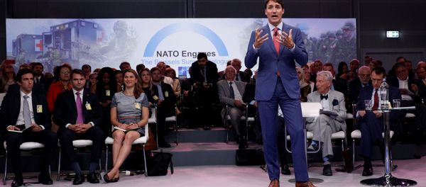 Canada's Prime Minister Justin Trudeau addresses the 'NATO Engages: The Brussels Summit Dialogue' event ahead of the NATO (North Atlantic Treaty Organization) summit, at the NATO headquarters in Brussels, on July 11, 2018 - Sputnik International