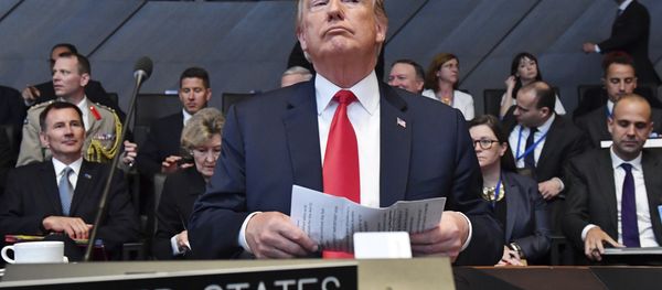 U.S. President Donald Trump attends a meeting of the North Atlantic Council during a summit of heads of state and government at NATO headquarters in Brussels on Wednesday, July 11, 2018. - Sputnik International