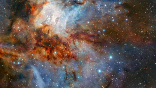 New observations with ESO’s Very Large Telescope show the star cluster RCW 38 in all its glory. This image was taken during testing of the HAWK-I camera with the GRAAL adaptive optics system. New observations with ESO’s Very Large Telescope show the star cluster RCW 38 in all its glory. This image was taken during testing of the HAWK-I camera with the GRAAL adaptive optics system. - Sputnik International
