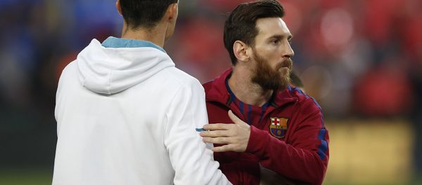 Barcelona's Lionel Messi, right and Real Madrid's Cristiano Ronaldo greets each other before a Spanish La Liga soccer match between Barcelona and Real Madrid, dubbed 'el clasico', at the Camp Nou stadium in Barcelona, Spain, Sunday, May 6, 2018 - Sputnik International