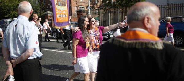 Protestant women pose for a selfie during an Orange Order march in Belfast on July 12, 2017 Protestant women pose for a selfie during an Orange Order march in Belfast on July 12, 2017 - Sputnik International