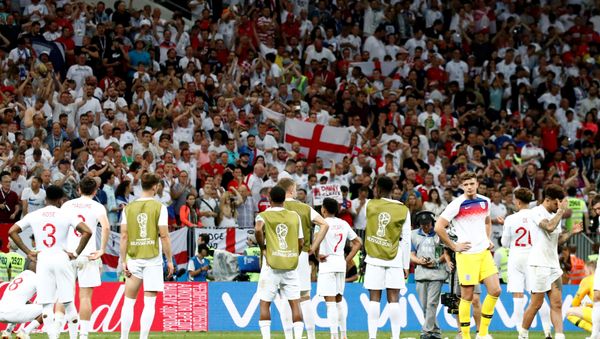 Soccer Football - World Cup - Semi Final - Croatia v England - Luzhniki Stadium, Moscow, Russia - July 11, 2018 England players look dejected as the England fans applaud them after the match - Sputnik International