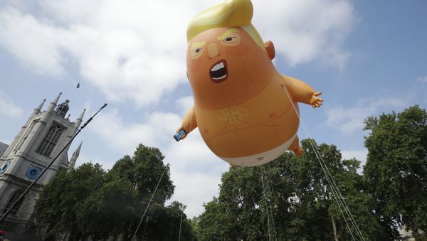 A six-meter high cartoon baby blimp of U.S. President Donald Trump is flown as a protest against his visit, in Parliament Square in London, England, Friday, July 13, 2018 - Sputnik International