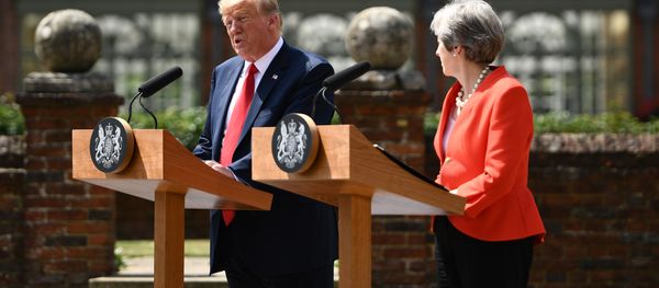 US President Donald Trump (L) and Britain's Prime Minister Theresa May hold a joint press conference following their meeting at Chequers, the prime minister's country residence, near Ellesborough, northwest of London on July 13, 2018 on the second day of Trump's UK visit US President Donald Trump (L) and Britain's Prime Minister Theresa May hold a joint press conference following their meeting at Chequers, the prime minister's country residence, near Ellesborough, northwest of London on July 13, 2018 on the second day of Trump's UK visit - Sputnik International