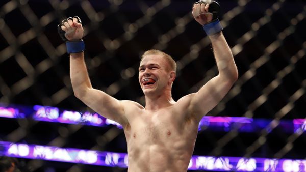 Michael McDonald celebrates a win against Brad Pickett after their UFC on Fox Sports 1 mixed martial arts bout in Boston, Saturday, August 17,2013 - Sputnik International