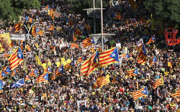 People hold banners during a protest against the imprisonment of the Catalan separatist leaders, in Barcelona, Spain, July 14, 2018. - Sputnik International