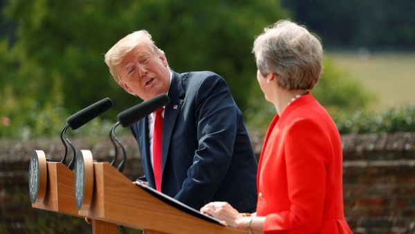 U.S. President Donald Trump and British Prime Minister Theresa May hold a press conference after their meeting at Chequers in Buckinghamshire, Britain July 13, 2018 U.S. President Donald Trump and British Prime Minister Theresa May hold a press conference after their meeting at Chequers in Buckinghamshire, Britain July 13, 2018 - Sputnik International