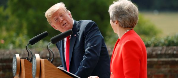 U.S. President Donald Trump and British Prime Minister Theresa May hold a press conference after their meeting at Chequers in Buckinghamshire, Britain July 13, 2018 U.S. President Donald Trump and British Prime Minister Theresa May hold a press conference after their meeting at Chequers in Buckinghamshire, Britain July 13, 2018 - Sputnik International