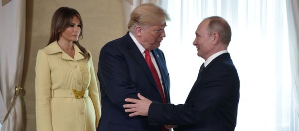 Russia's President Vladimir Putin (R) greets U.S. President Donald Trump, as First lady Melania Trump stands nearby, during a meeting in Helsinki, Finland July 16, 2018 Russia's President Vladimir Putin (R) greets U.S. President Donald Trump, as First lady Melania Trump stands nearby, during a meeting in Helsinki, Finland July 16, 2018 - Sputnik International