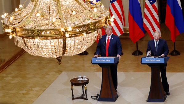 U.S. President Donald Trump and Russian President Vladimir Putin hold a joint news conference after their meeting in Helsinki, Finland, July 16, 2018 - Sputnik International