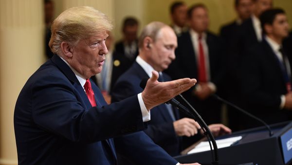 US President Donald Trump and Russia's President Vladimir Putin attend a joint press conference after a meeting at the Presidential Palace in Helsinki, on July 16, 2018 US President Donald Trump and Russia's President Vladimir Putin attend a joint press conference after a meeting at the Presidential Palace in Helsinki, on July 16, 2018 - Sputnik International