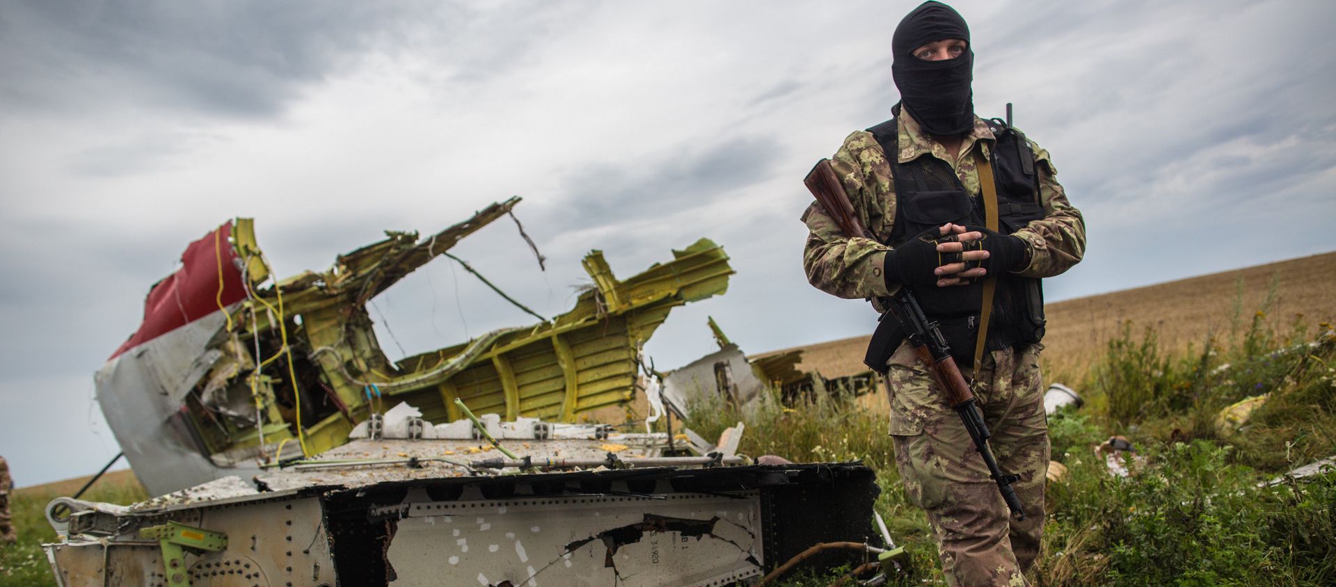 A militiaman at the crash site of the Malaysia Airlines Boeing 777 aircraft near Shakhtyorsk, Donetsk Region. File photo - Sputnik International, 1920, 09.02.2021
