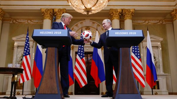 U.S. President Donald Trump receives a football from Russia's President Vladimir Putin during their joint news conference after a meeting in Helsinki, Finland, July 16, 2018 U.S. President Donald Trump receives a football from Russia's President Vladimir Putin during their joint news conference after a meeting in Helsinki, Finland, July 16, 2018 - Sputnik International