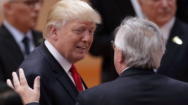 European Commission President Jean-Claude Juncker, right, talks to U.S. President Donald Trump, left, prior to a working session at the G-20 summit in Hamburg, northern Germany, Saturday, July 8, 2017 - Sputnik International