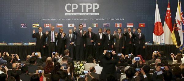 (File) From left, Singapore's Minister for Trade and Industry Lim Hng Kiang, New Zealand Trade Minister David Parker, General Secretary Ministry of International Trade and Industry of Malaysia Y.Bhg. Datuk J. Jayasiri, Canada's Minister of International Trade Francois-Philippe Champagne, Australian Minister for Trade and Investment Steven Ciobo, Chile's Foreing Minister Heraldo Munoz, Brunei's Foreign Minister Haji Erawan bin Pehin Yusof, Japan's Trans-Pacific Partnership minister Toshimitsu Motegi, Secretary of Economy of Mexico Idelfonso Guajardo, Peru's Trade Minister Eduardo Ferreyros and Vietnamese Trade Minister Tran Tuan Anh, poses for a pictures after the signing ceremony of the Comprehensive and Progressive Agreement for Trans-Pacific Partnership, CP TPP, in Santiago, Chile, Thursday, March 8, 2018 - Sputnik International